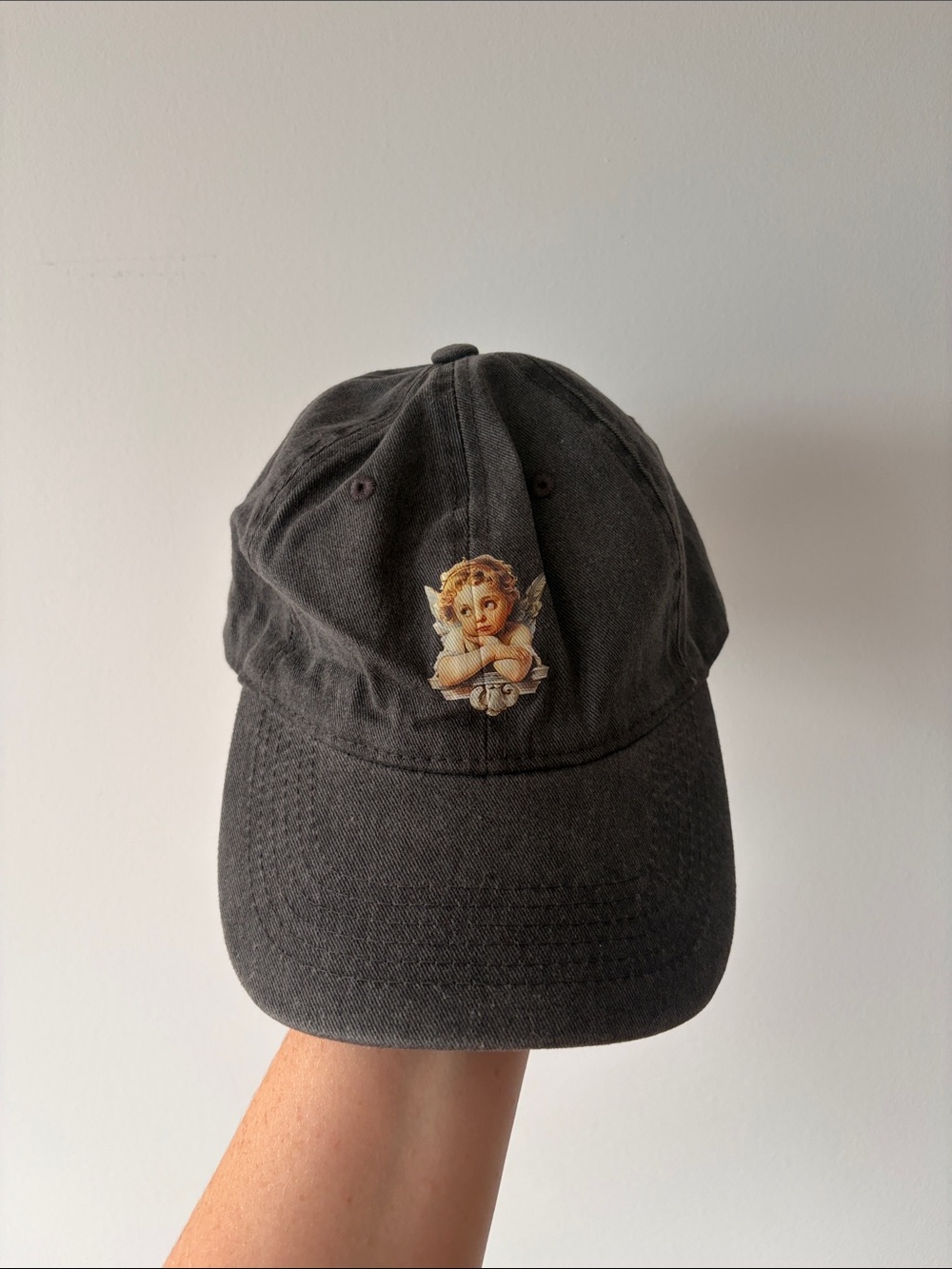 Black Baseball Cap with Cherub Embroidery